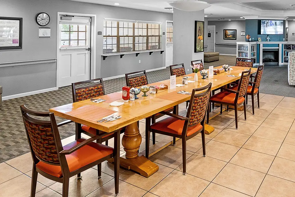 Chef putting the finishing touches on a delicious-looking plate of food